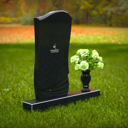 Elegant curved granite headstones with layered detailing for timeless memorials.