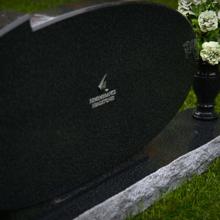 Oval granite headstones with timeless elegance for memorial tribute.
