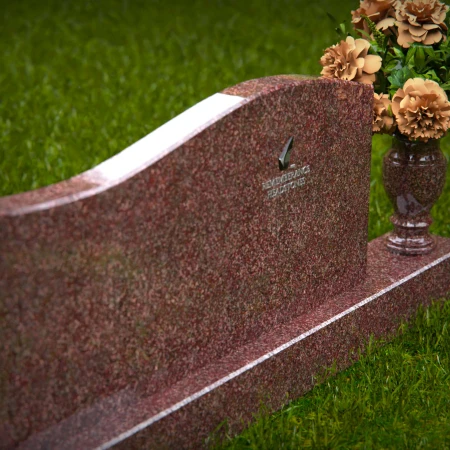 Beautiful headstones with wave design symbolizing life’s continuity.