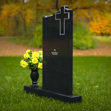Upright granite headstones with cross design and flower vase.