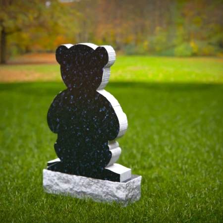 Blessed headstone near me engraved with child’s heart and teddy