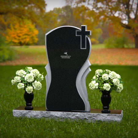 Graceful memorial headstones with cross detail for sacred remembrance.