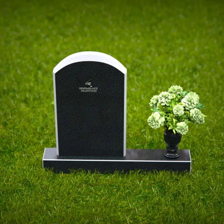 Classic arched headstones with elegant polished edges for tribute.