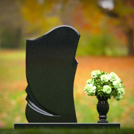 Modern asymmetrical granite headstones with elegant and unique design.