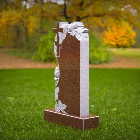 A spiritual emblem and blooming rose form this sculpted headstone prices