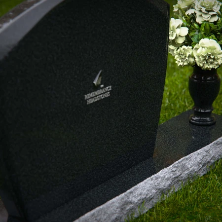 Classic arched granite headstones designed for a timeless memorial.