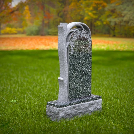 The sheltering arch over a life-giving tree defines these tombstones