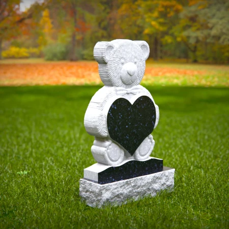 Blessed headstone near me engraved with child’s heart and teddy