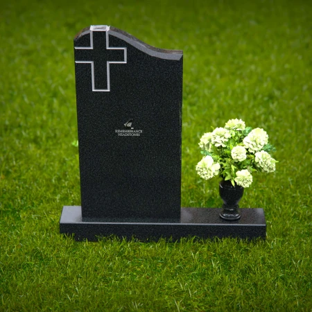 Granite headstones featuring a cross design and flower vase.