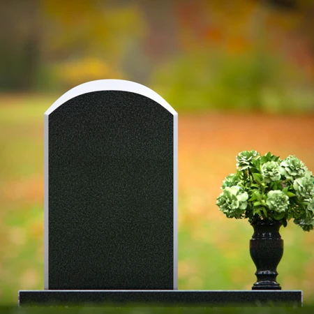 Classic arched headstones with elegant polished edges for tribute.