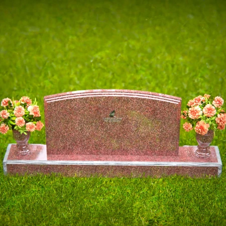 Dual vase headstones with arched design honoring shared memories.