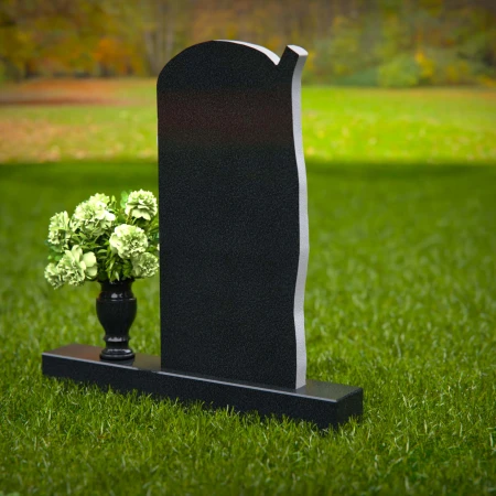 Elegant headstones featuring a tree design symbolizing growth and life.