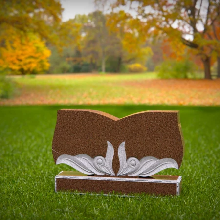Elegant storytelling carved into this open book headstone prices