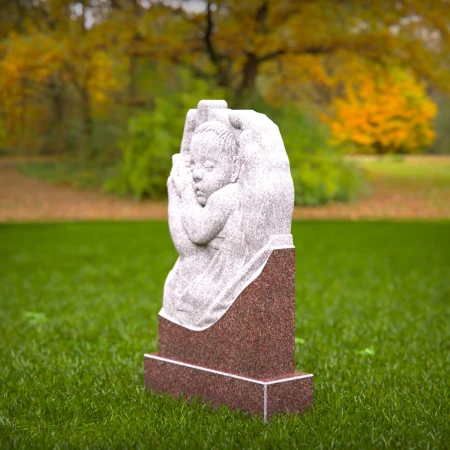 Sacred angel hands holding sleeping baby on headstones