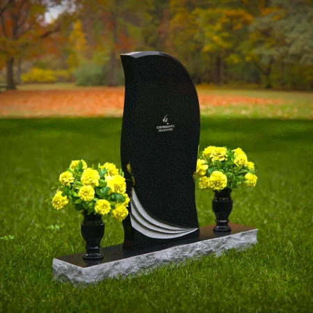 Elegant curved granite headstones with wave accents for timeless memorials.