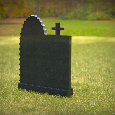 Religious headstones featuring Virgin Mary and cross for sacred memorials.
