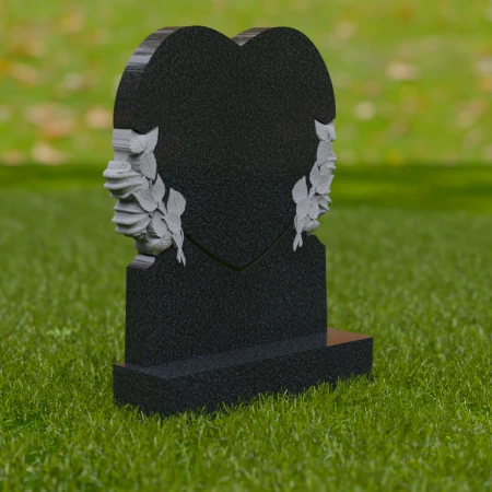 1736 - Herzförmiger Grabstein aus Granit mit Rosen-Schnitzereien