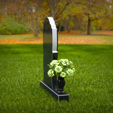 Elegant oval granite headstones with layered accents for lasting tributes.