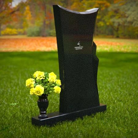 Contemporary granite memorial headstones with unique curved design.
