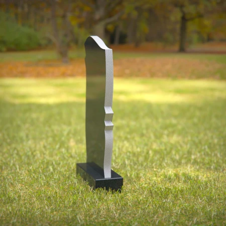 Modern curved headstones offering a sleek tribute to loved ones.