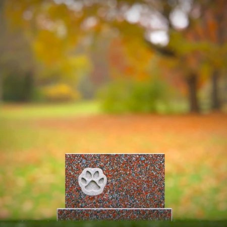 memorial honoring a pet with engraved paw impression for memorials
