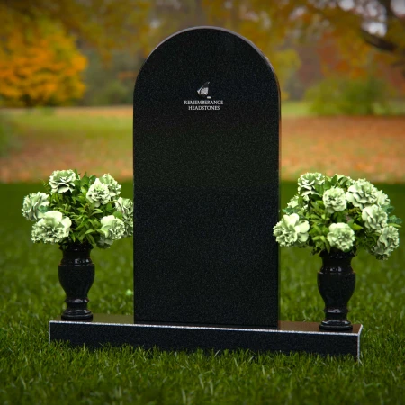 Elegant headstones with arched design symbolizing timeless memory.