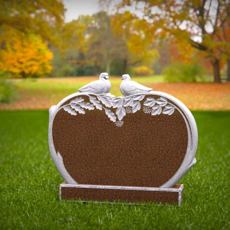 paired birds carved into granite for timeless remembrance for headstones