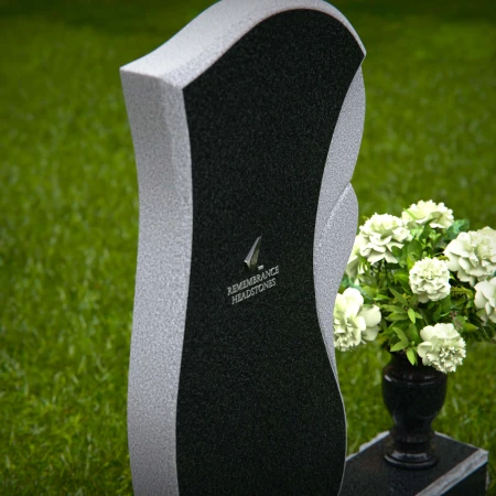 Modern wave design headstones with elegant detailing for tribute.