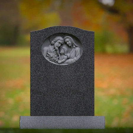 1917 - Upright Monument with Family Relief Carving in Peaceful Setting