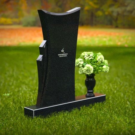 Contemporary headstones featuring a flowing design and floral vase.