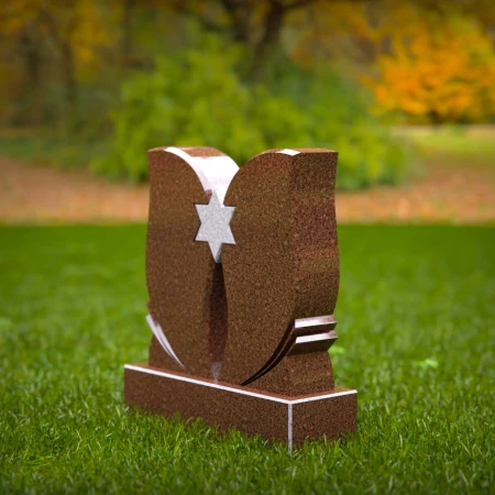 Elevated headstone designs balanced between grace and might