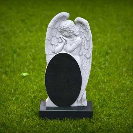 1861 - Angel Memorial Headstone with Carved Praying Figure and Oval Inscription Panel