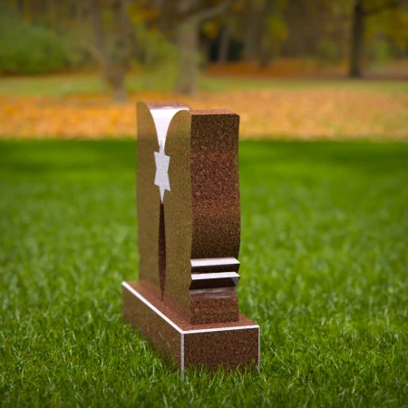 Elevated headstone designs balanced between grace and might