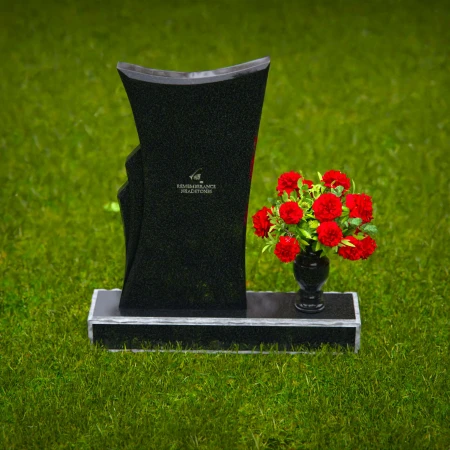Contemporary granite headstones with unique shape and flower vase.