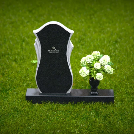 Elegant curved granite headstones crafted as a timeless memorial tribute.
