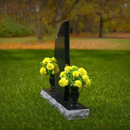 Elegant asymmetrical granite headstones crafted as unique memorial tributes.
