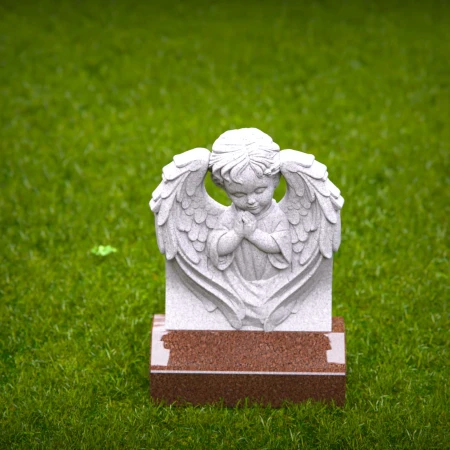 Reflective child tombstones carved with kneeling cherub angel