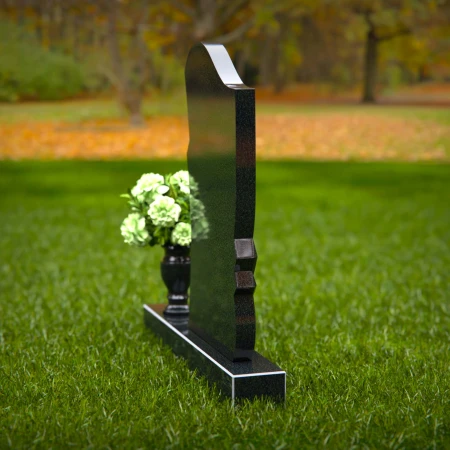 Modern asymmetrical granite headstones with elegant and unique design.
