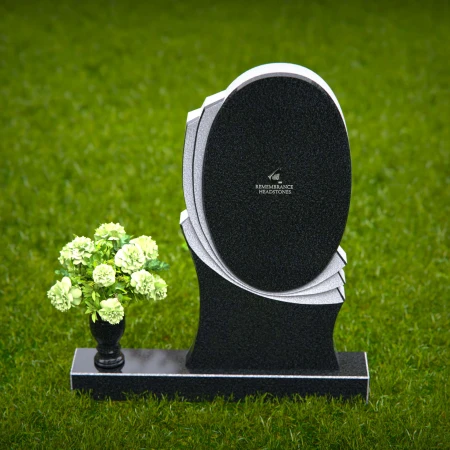 Elegant oval granite headstones with layered accents for lasting tributes.