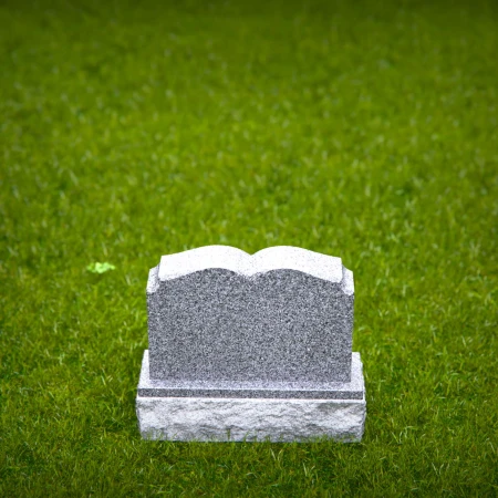 1951 - Elegant Double Upright Granite Headstone with Soft Arched Top