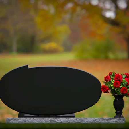 Oval granite headstones with timeless elegance for memorial tribute.