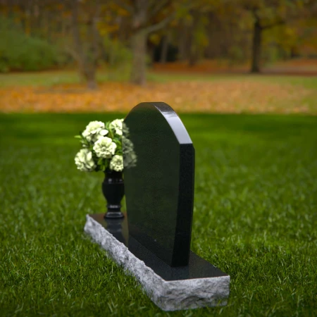 Classic arched granite headstones designed for a timeless memorial.