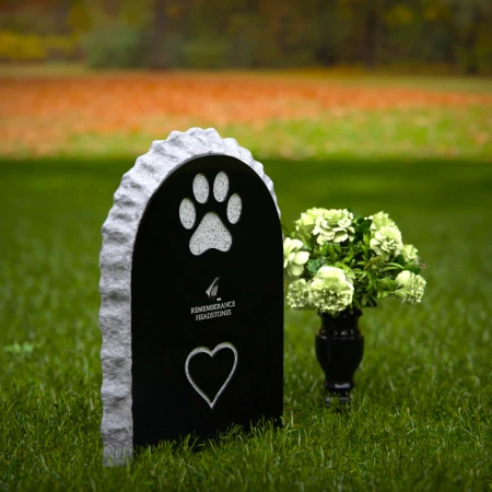 Pet memorial headstones with heart design honoring eternal love.