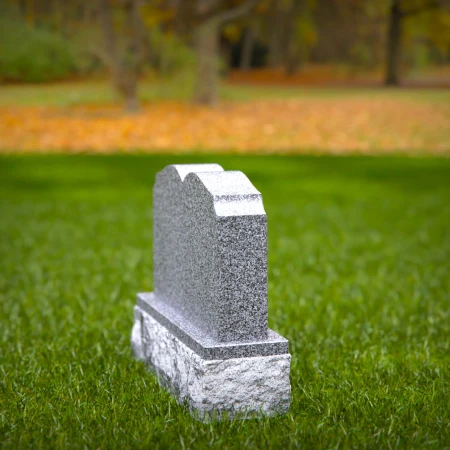 1951 - Elegant Double Upright Granite Headstone with Soft Arched Top