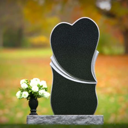 Modern heart-shaped granite headstones with elegant layered design.
