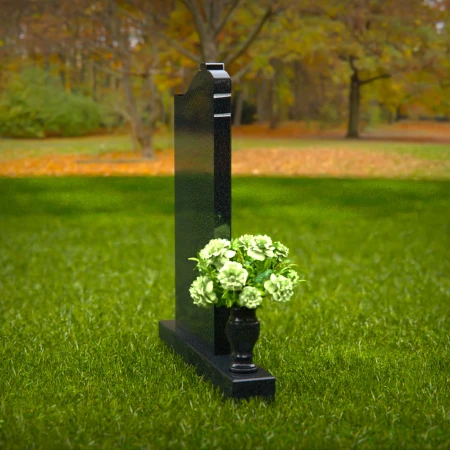 Granite headstones with cross engraving symbolizing faith and remembrance.