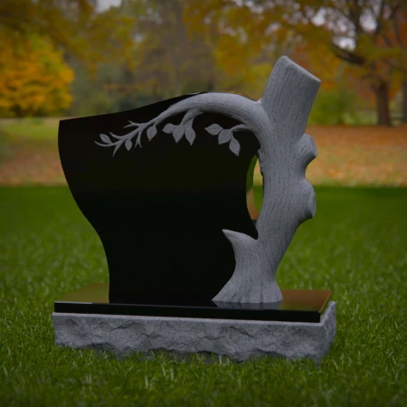 1928 - Nature-Inspired Monument with Carved Tree and Leaf Branch Design