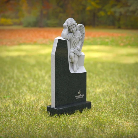 1240 - Angel Sitting on Granite Headstone – Elegant Memorial Tribute