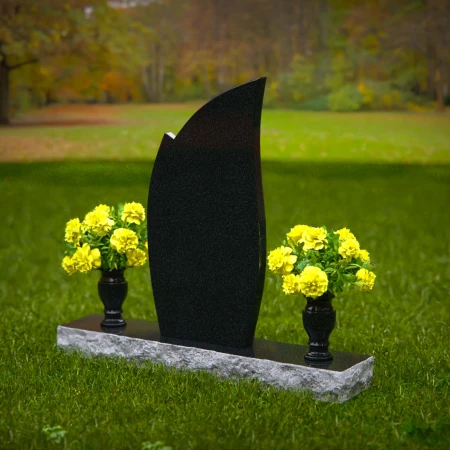 Elegant asymmetrical granite headstones crafted as unique memorial tributes.