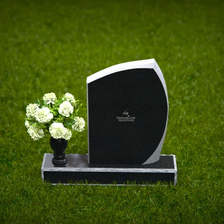 Modern angled granite headstones with vase inclusion for tribute.